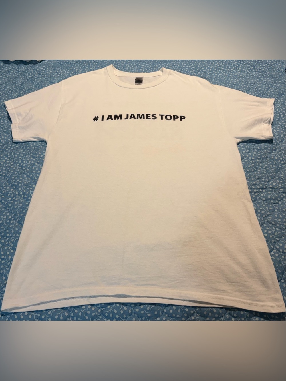 Gildan “I AM James Topp” white t-shirt, women’s large.